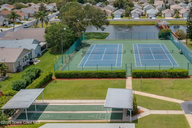a view of yard with swimming pool and outdoor seating