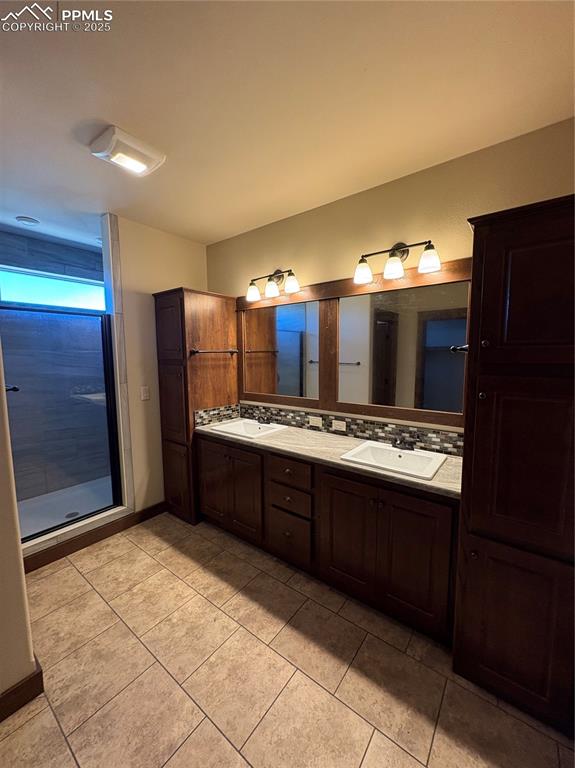 1925 Doe Valley Road Guffey, CO 80820 - Photo 9 of 30 a large kitchen with a stove and refrigerator