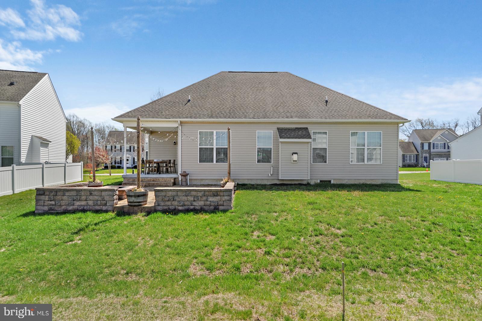 609 Olde Field Drive Magnolia, DE 19962 - Photo 2 of 14 a view of a house with a yard and sitting area