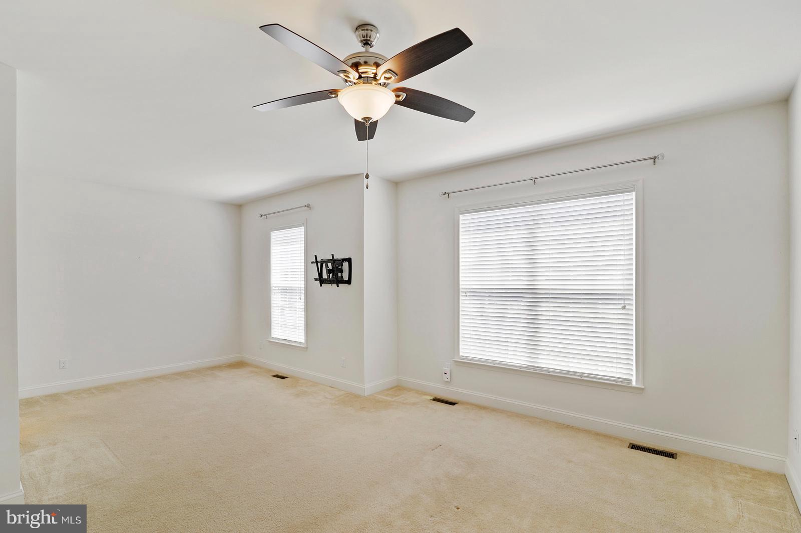 609 Olde Field Drive Magnolia, DE 19962 - Photo 9 of 14 a view of an empty room with a window