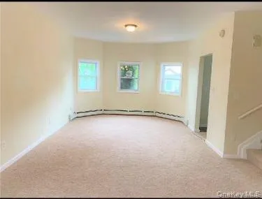 a view of a room with rack on the wall