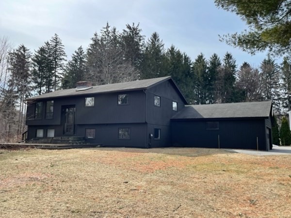 a house view with a outdoor space