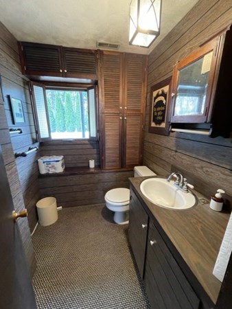 6 Beaver Place Billerica, MA 01821 - Photo 20 of 25 a bathroom with a granite countertop sink mirror vanity and toilet