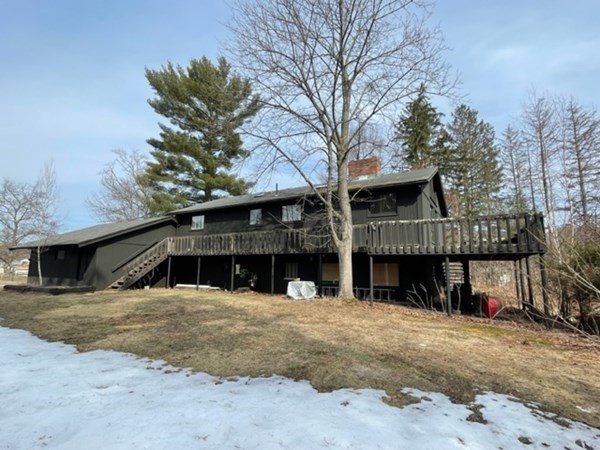 6 Beaver Place Billerica, MA 01821 - Photo 25 of 25 a view of a house with a snow in the yard