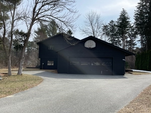 6 Beaver Place Billerica, MA 01821 - Photo 3 of 25 a picture of a house with a yard