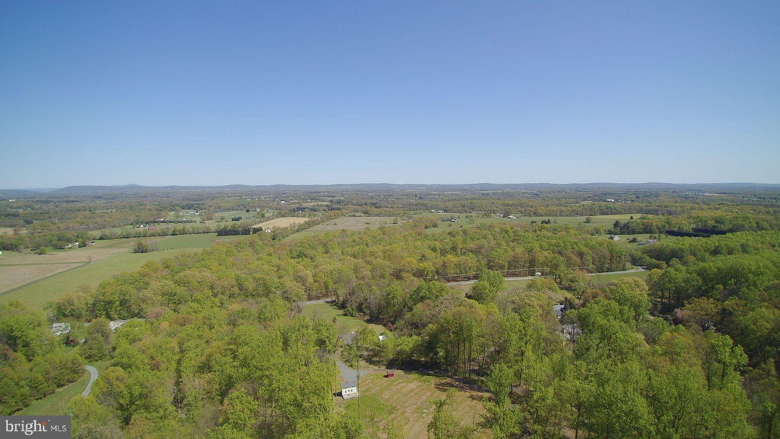 13477 Mountain Road Lovettsville, VA 20180 - Photo 16 of 16 a view of a field with an ocean