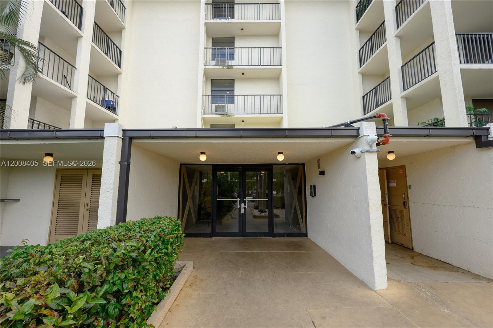 6195 Rock Island Road, Unit 503 Tamarac, FL 33319 - Photo 28 of 29 a view of a building with a entryway