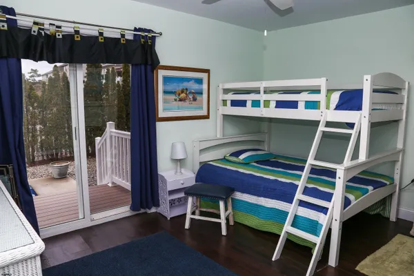 a room with a bed and a window