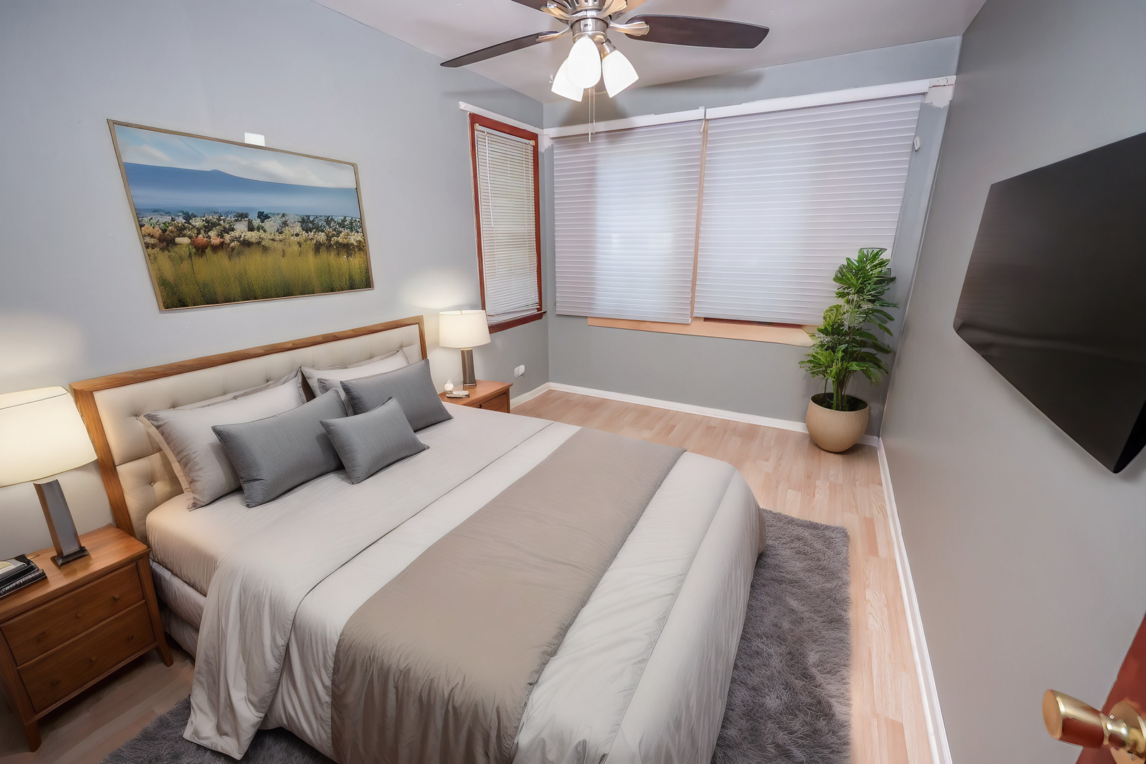 200 South Park Road Joliet, IL 60433 - Photo 5 of 11 a bedroom with bed and a chandelier