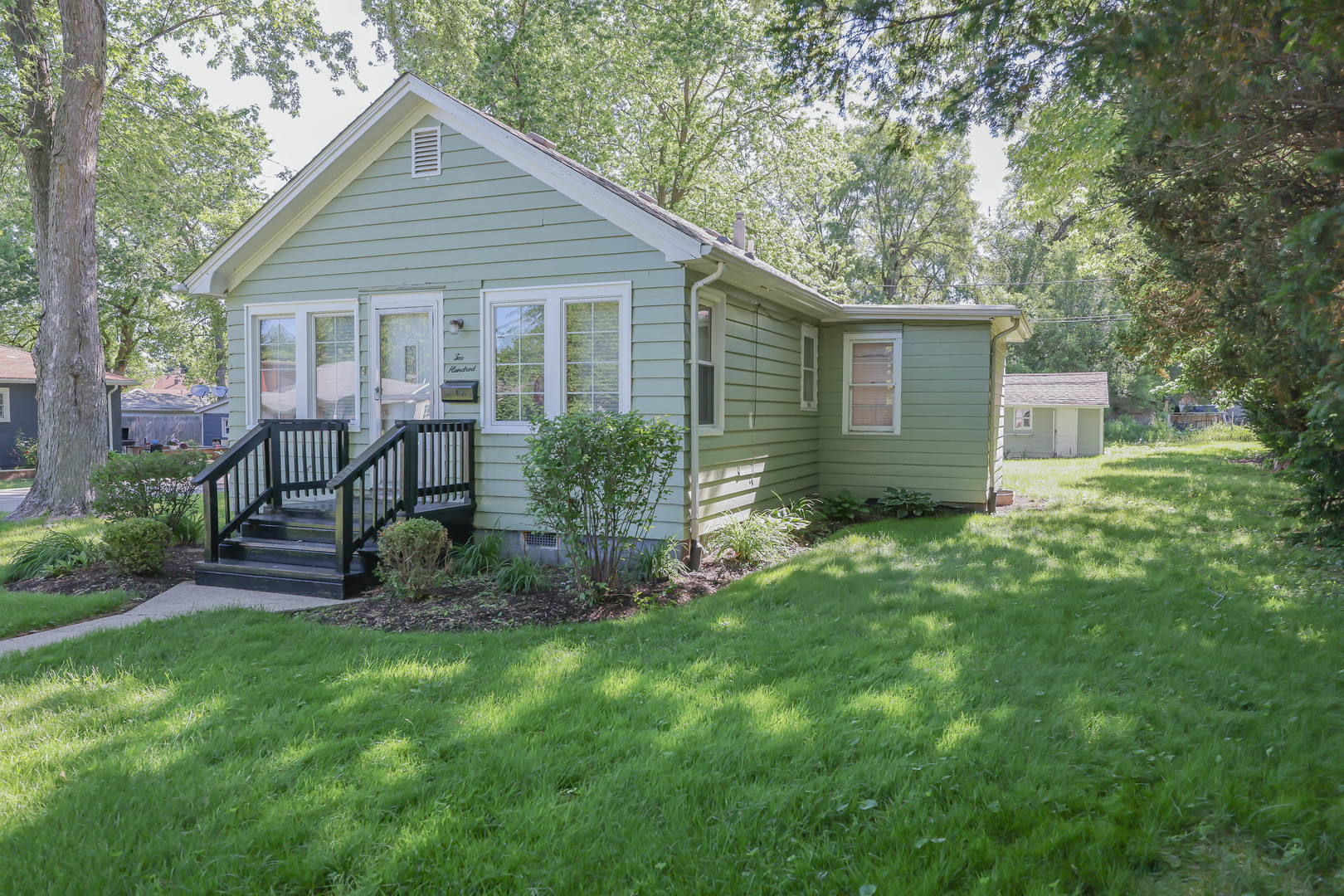 200 South Park Road Joliet, IL 60433 - Photo 7 of 11 a view of a house with a yard and sitting area