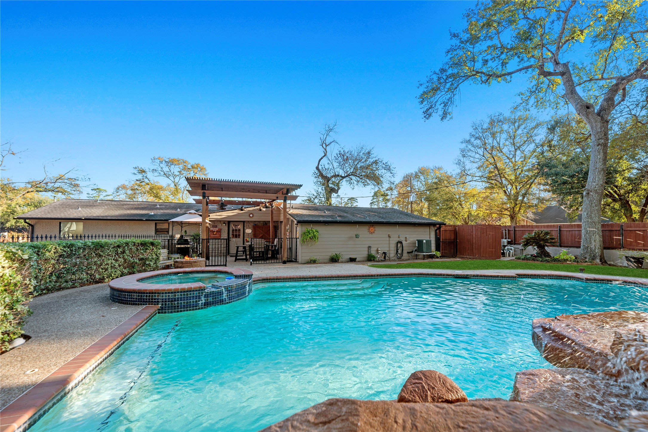 Experience the ultimate resort-style living at 1203 Lemm Road 2. Nestled on an expansive corner lot in the heart of Spring, this traditional ranch-style home offers a rare blend of luxury and freedom with no HOA fees or restrictions.