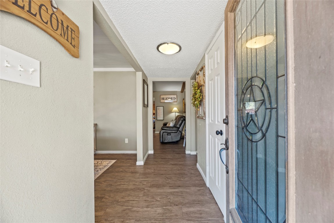 1203 Lemm Road 2 Spring, TX 77373 - Photo 3 of 21 A beautiful glass-inset front door featuring a Texas star design welcomes you into a bright, open-concept interior designed for both comfort and style.