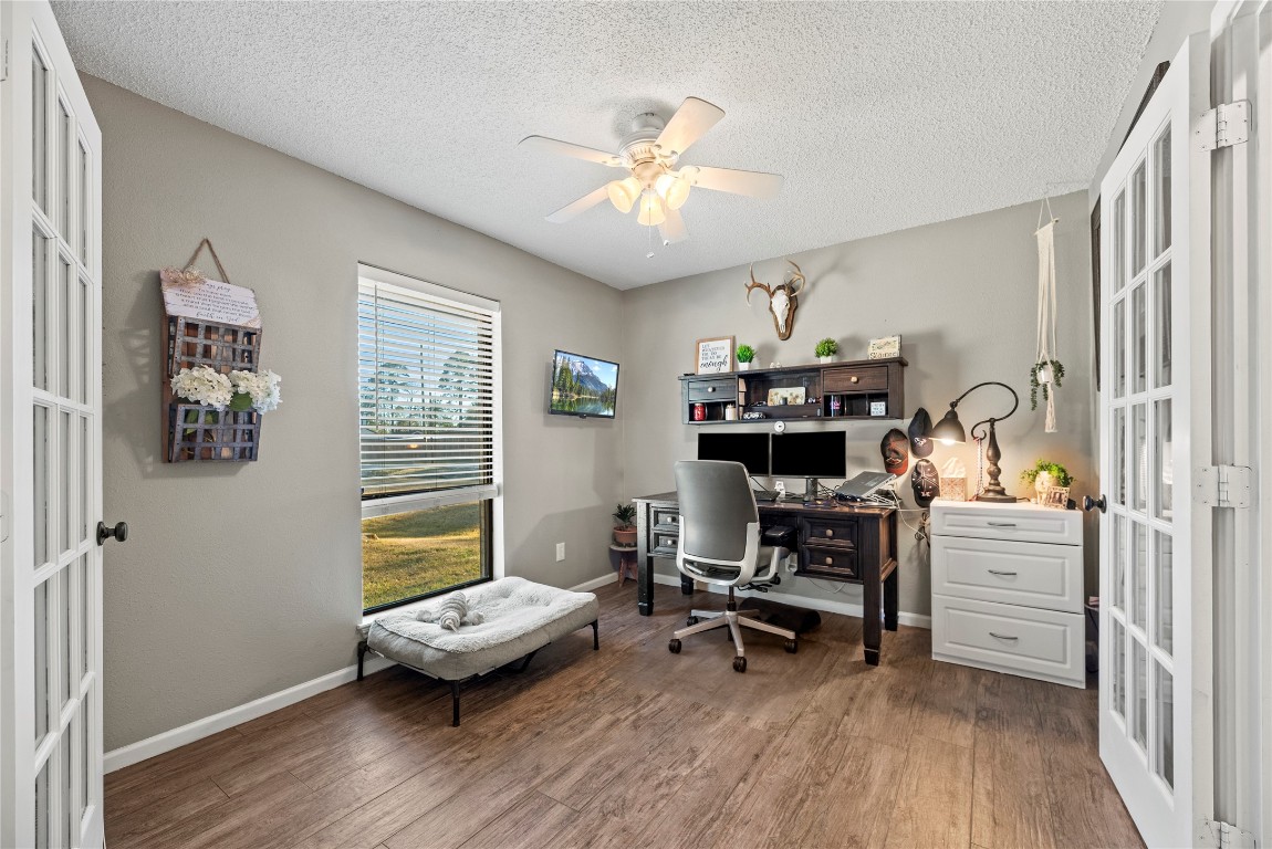 1203 Lemm Road 2 Spring, TX 77373 - Photo 4 of 21 Work from home with ease in this private study located behind elegant french doors, offering quiet views of the lush front lawn.