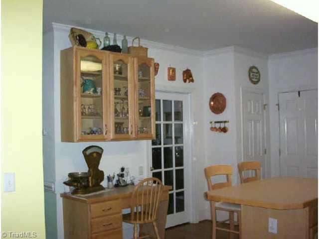 1806 Ridge Oaks Drive Oak Ridge, NC 27310 - Photo 7 of 9 Other. There is a built in desk located in the kitchen.