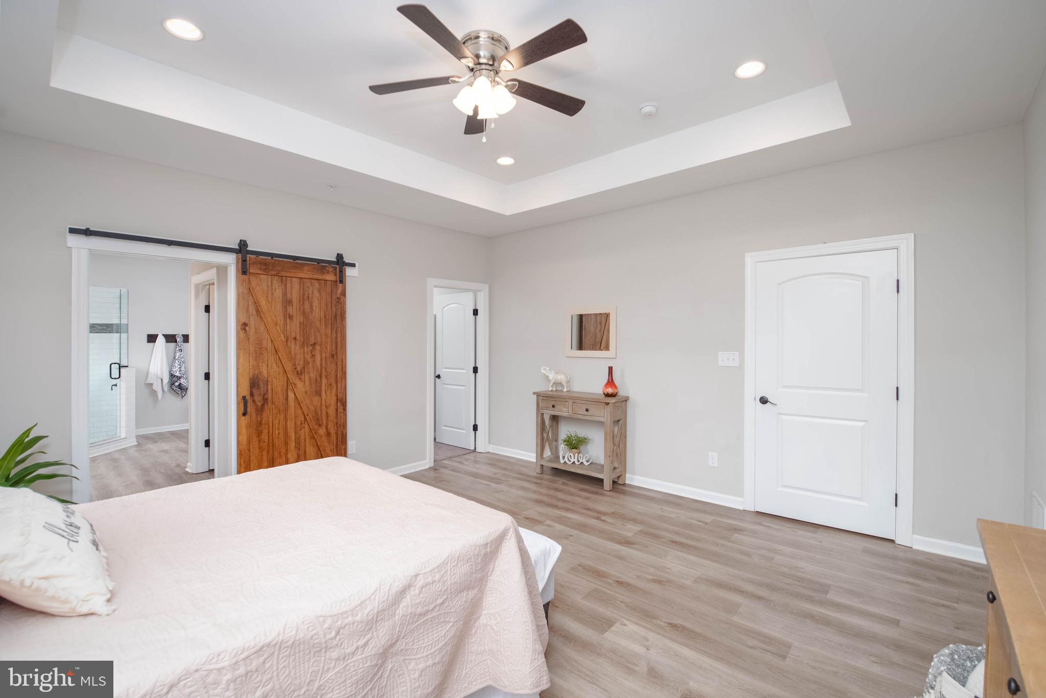 1132 Ridge Road Rising Sun, MD 21911 - Photo 20 of 54 Primary Suite w/ Barn Door to Luxury Bath