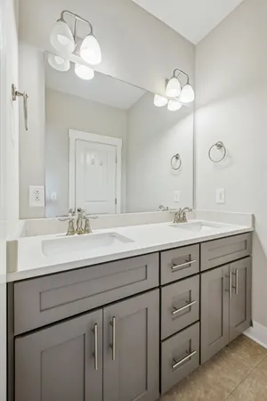 a workspace with wooden floor windows and a ceiling fan