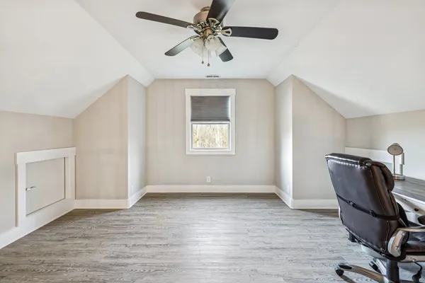an aerial view of residential building with ocean view