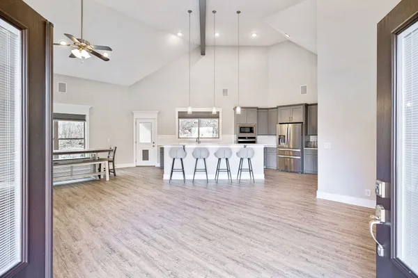 a view of a kitchen and dining room