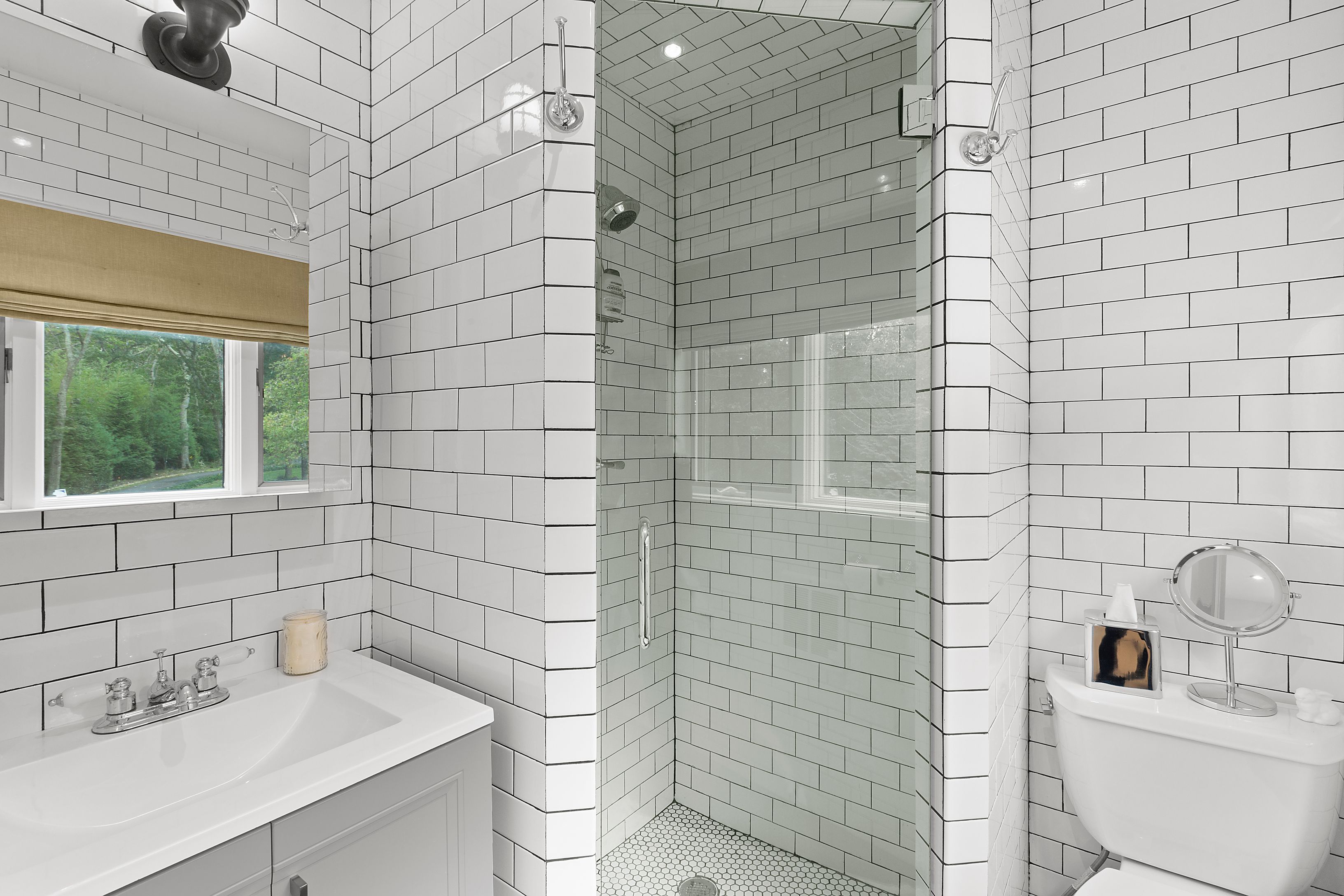 81 Neck Path East Hampton, NY 11937 - Photo 12 of 29 a bathroom with a sink and a toilet