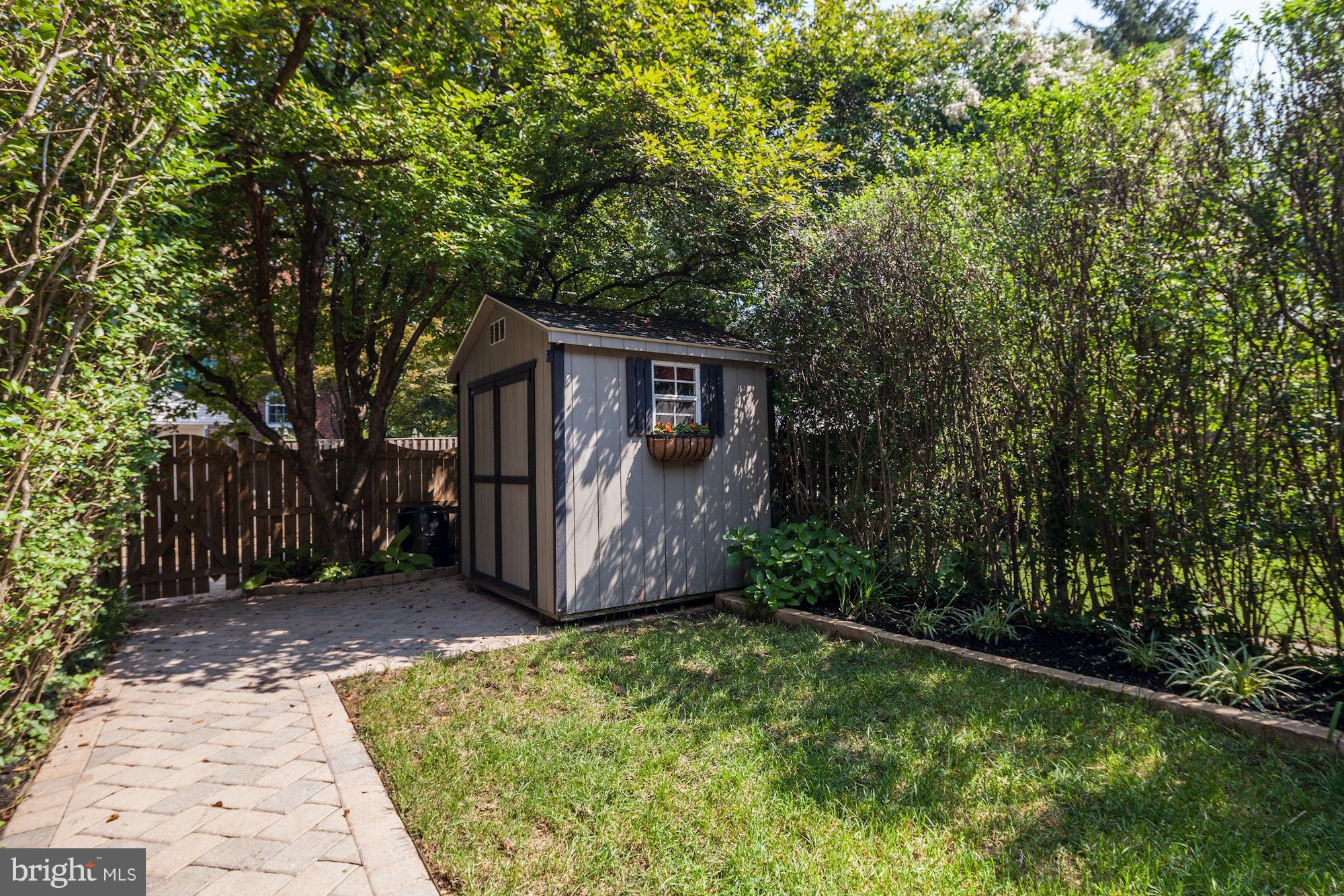 144 Hopkins Road Baltimore, MD 21212 - Photo 26 of 30 Extensive pavers. Grassy yard. Shed that becomes..