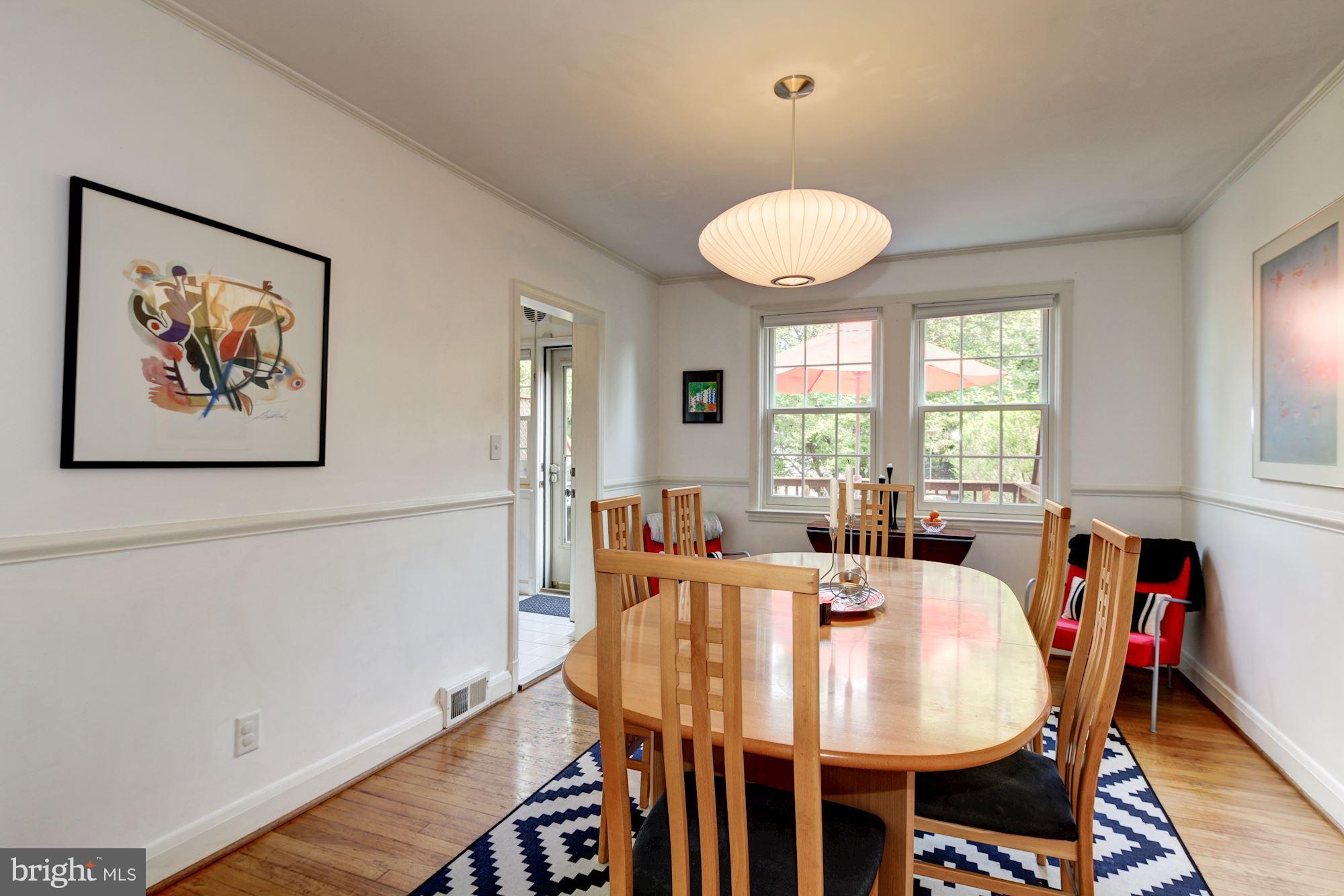 144 Hopkins Road Baltimore, MD 21212 - Photo 7 of 30 Dining Room leads to updated kitchen