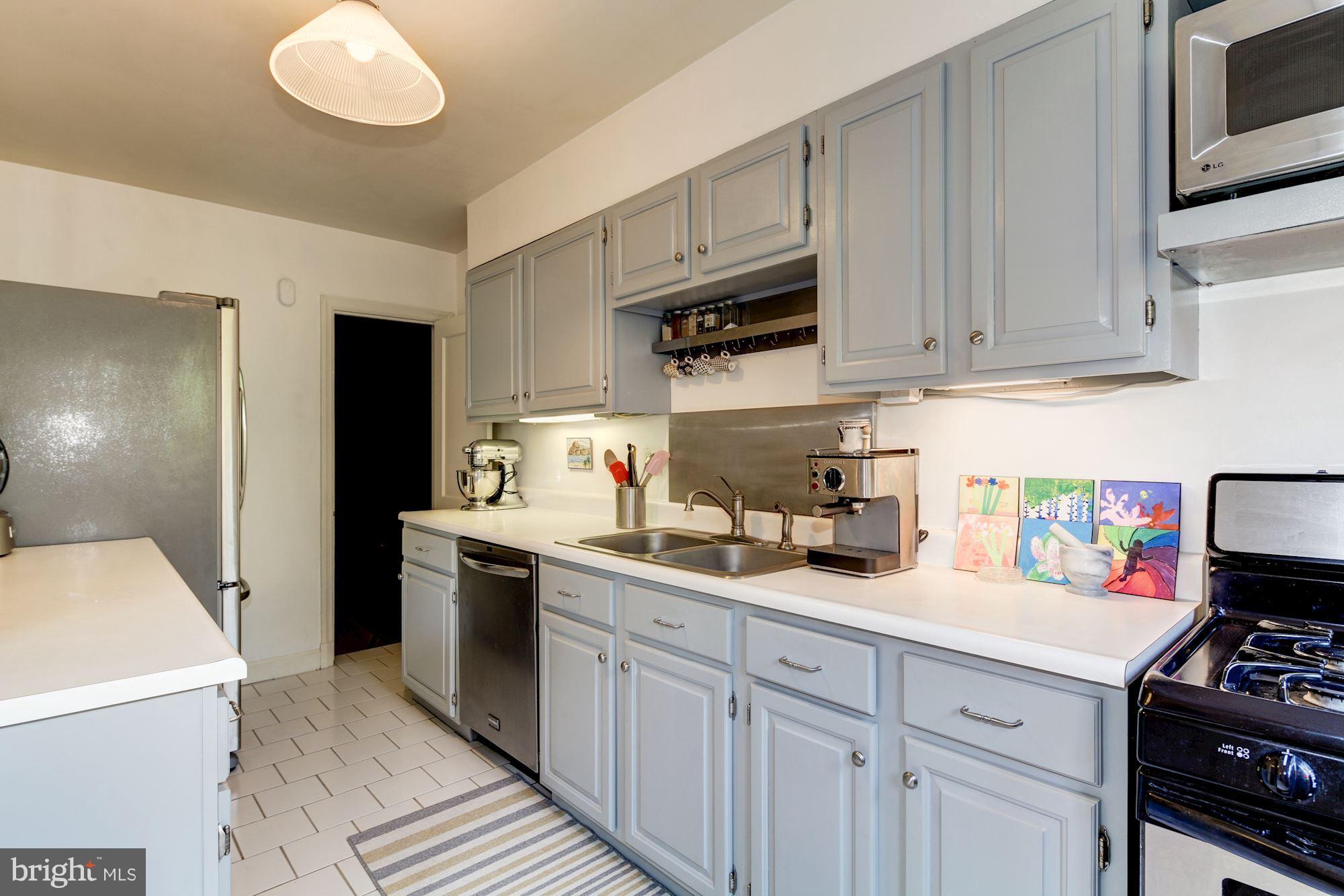 144 Hopkins Road Baltimore, MD 21212 - Photo 9 of 30 Ceramic flooring, updated painted cabinets