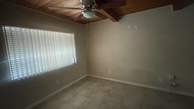 en empty room with windows