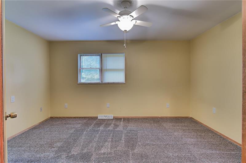 112 Wycliffe Way Butler, PA 16001 - Photo 14 of 24 Bedroom #2, or whatever you want it to be! See that fan? Its included too! Woo hoo! Located in front of the house, middle.