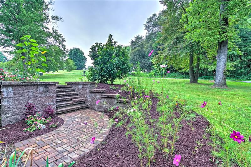 112 Wycliffe Way Butler, PA 16001 - Photo 20 of 24 New stone and brick walkway from the parking area to the front door. But you will probably enter via the integral garage into the basement.