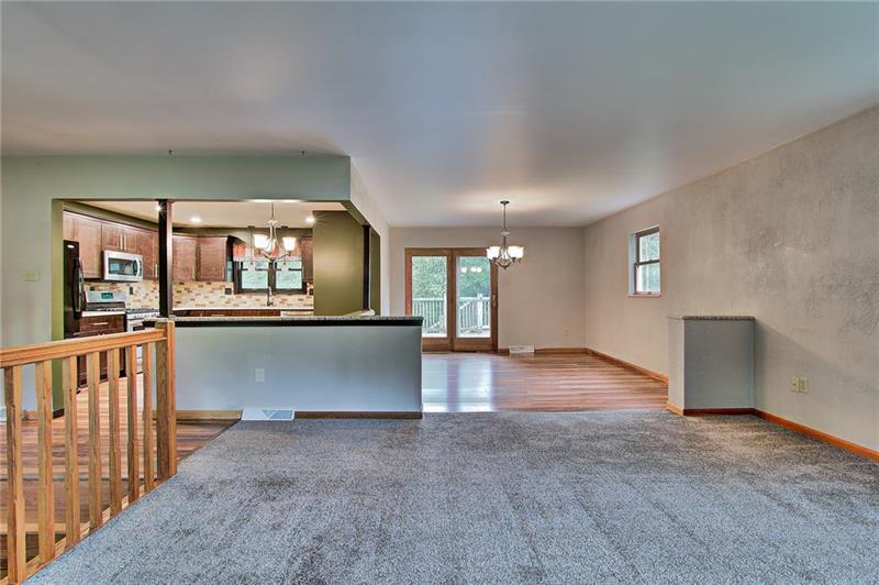 112 Wycliffe Way Butler, PA 16001 - Photo 6 of 24 Open concept in the main living area. French doors in the dining room onto the huge back deck.