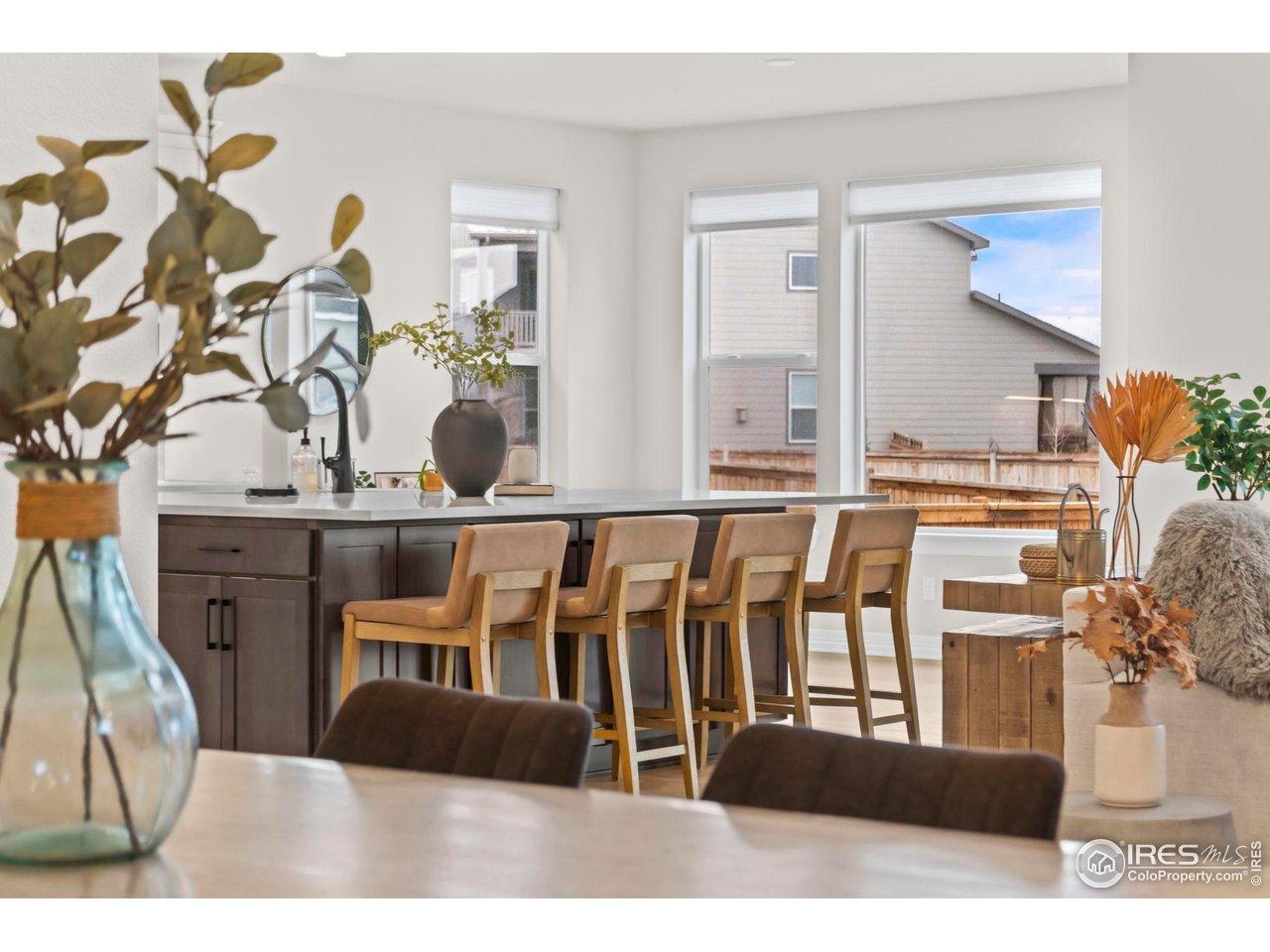 4344 Shivaree Court Timnath, CO 80547 - Photo 11 of 41 Oversized Island offering seating for four