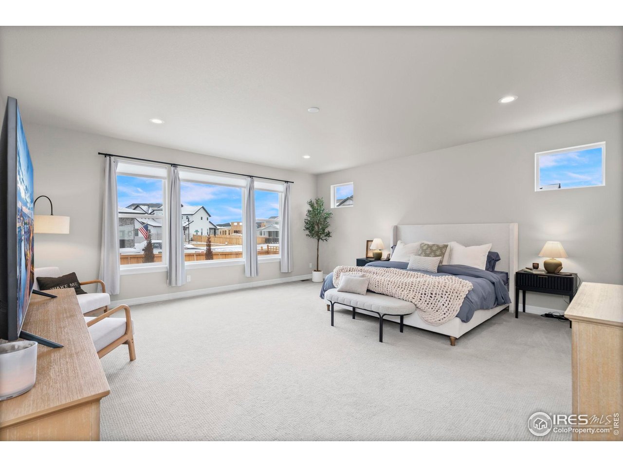 4344 Shivaree Court Timnath, CO 80547 - Photo 20 of 41 Spacious main floor primary suite offering s serene retreat.