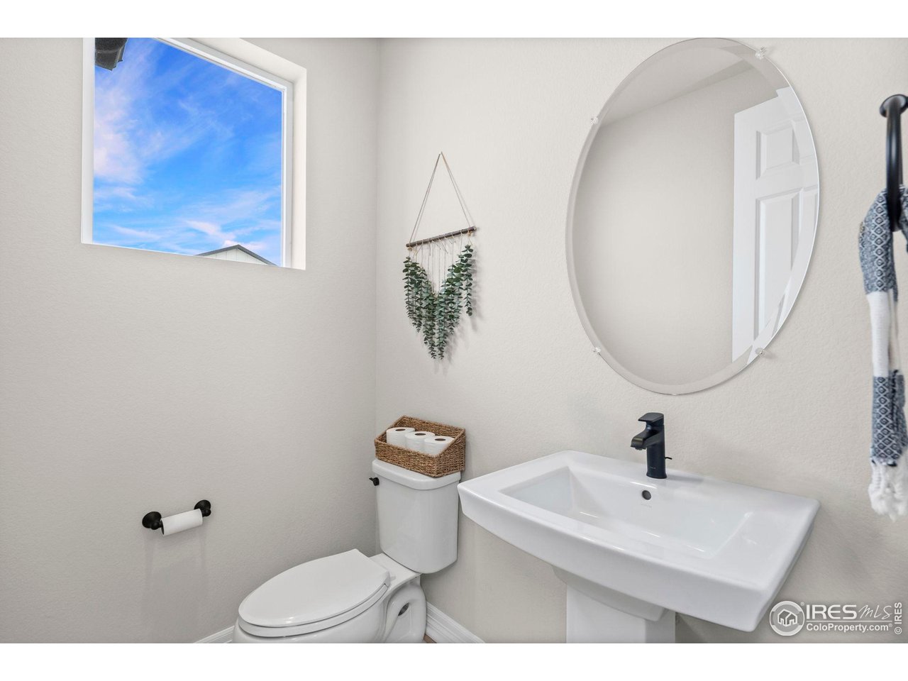 4344 Shivaree Court Timnath, CO 80547 - Photo 27 of 41 Stylish main-level bathroom