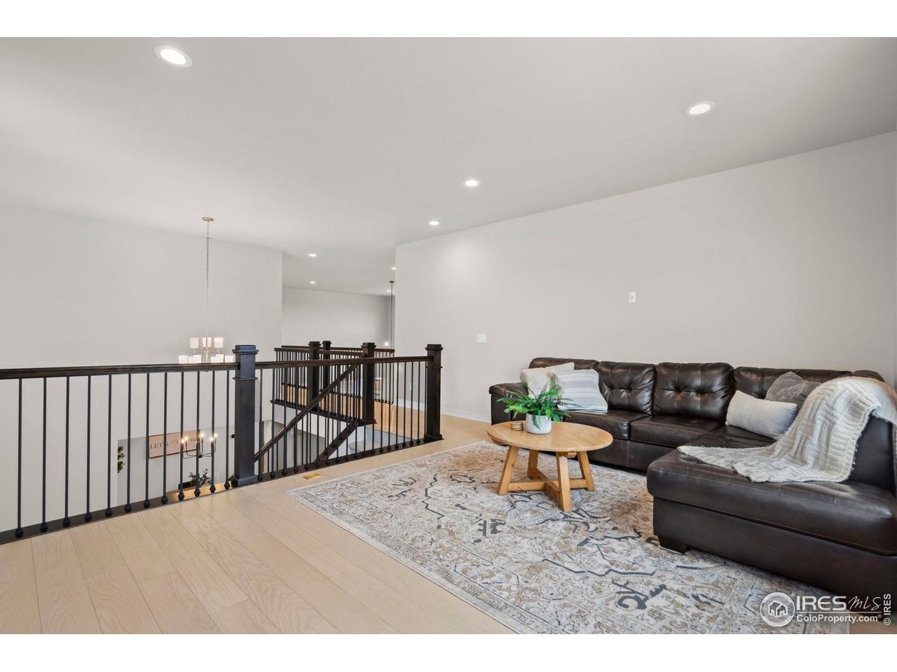 4344 Shivaree Court Timnath, CO 80547 - Photo 28 of 41 Spacious upstairs loft offers a flexible bonus space for media and play