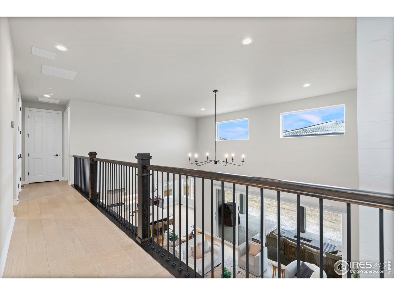 4344 Shivaree Court Timnath, CO 80547 - Photo 30 of 41 Open hallway leads to bedrooms