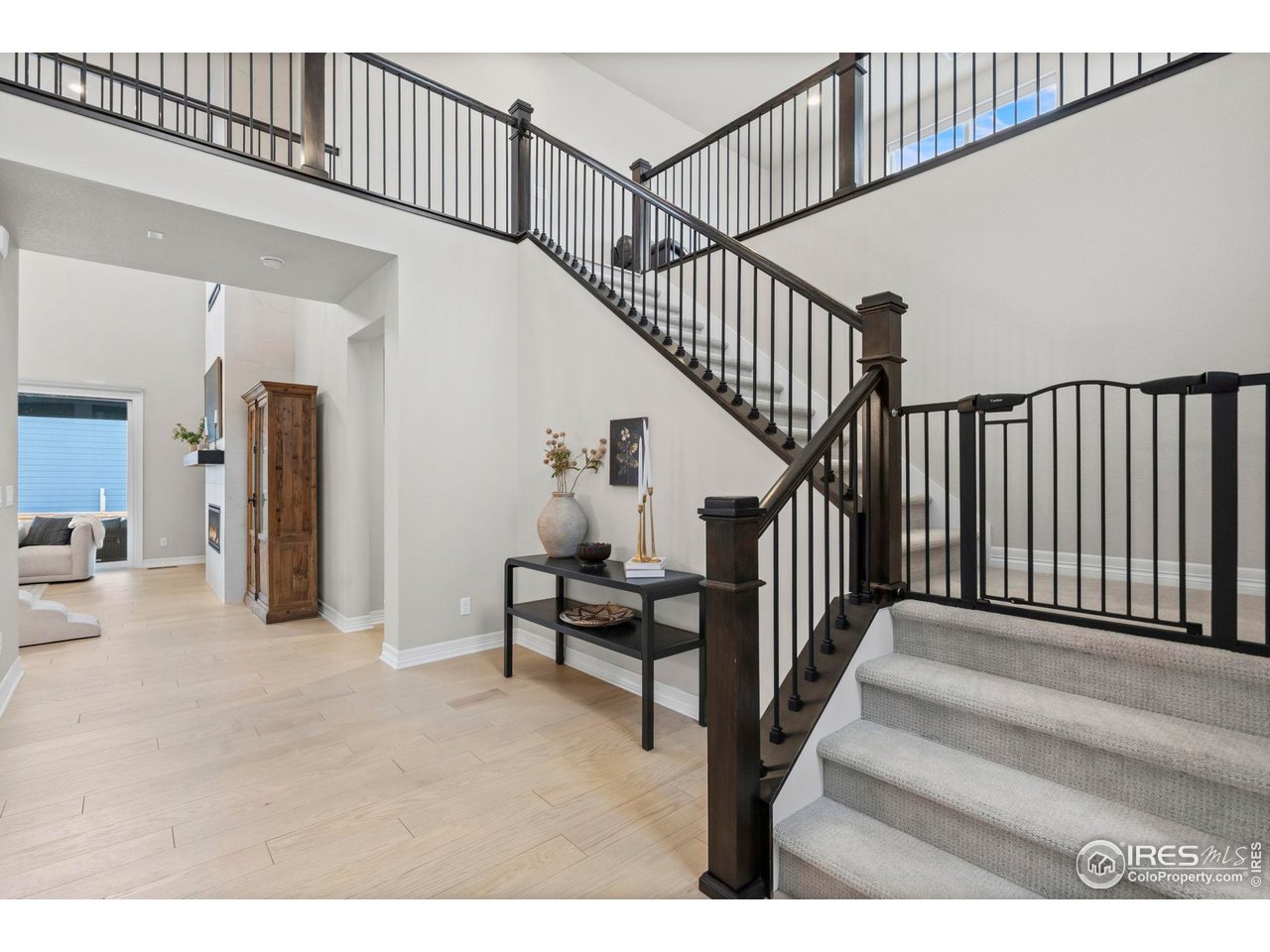 4344 Shivaree Court Timnath, CO 80547 - Photo 3 of 41 Grand welcoming foyer welcomes you with high ceilings and a striking entryway