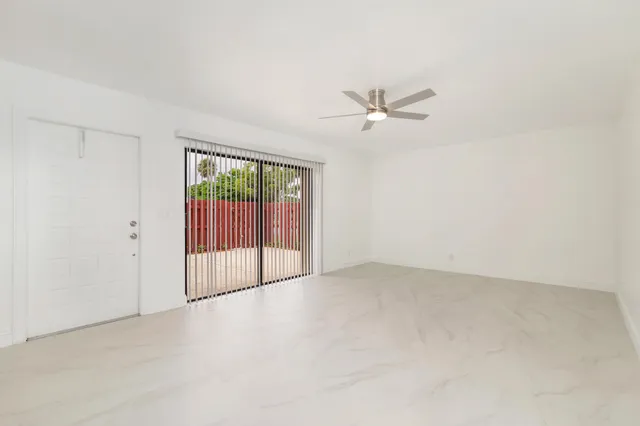 an empty room with fan