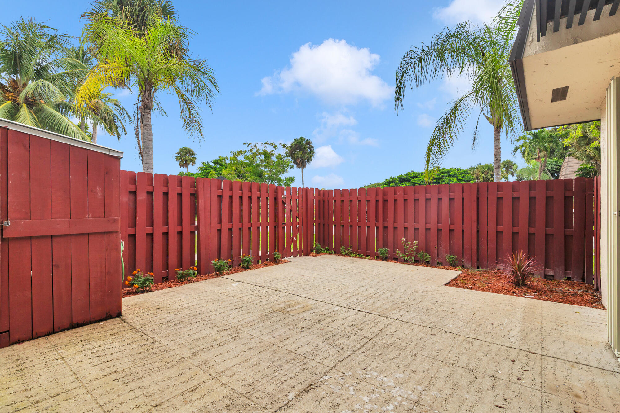 326 Jupiter Lakes Boulevard, Unit 2310B Jupiter, FL 33458 - Photo 39 of 48 a view of wooden fence