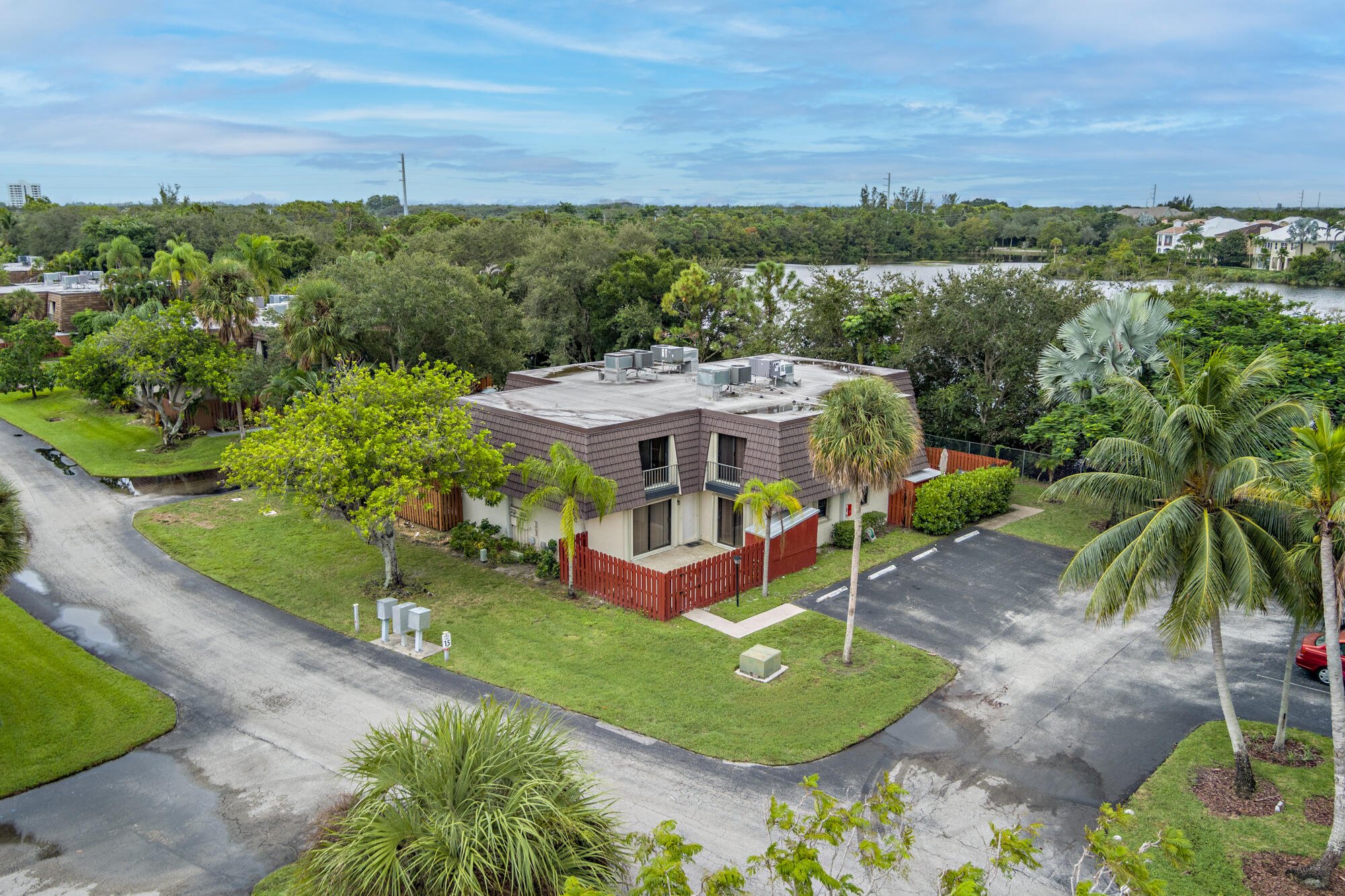 326 Jupiter Lakes Boulevard, Unit 2310B Jupiter, FL 33458 - Photo 48 of 48 an aerial view of a house with a yard