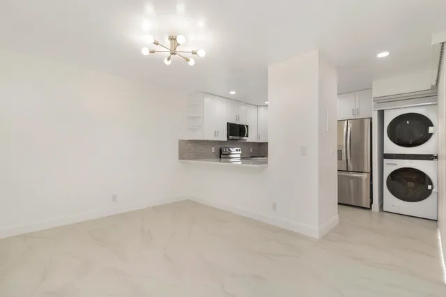 a view of a washer and dryer in a room