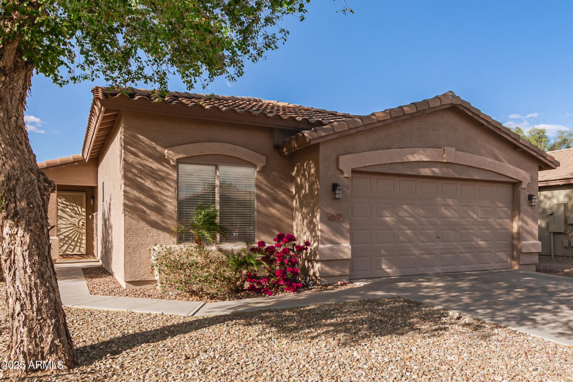 42292 West Venture Road Maricopa, AZ 85138 - Photo 4 of 27 a front view of a house