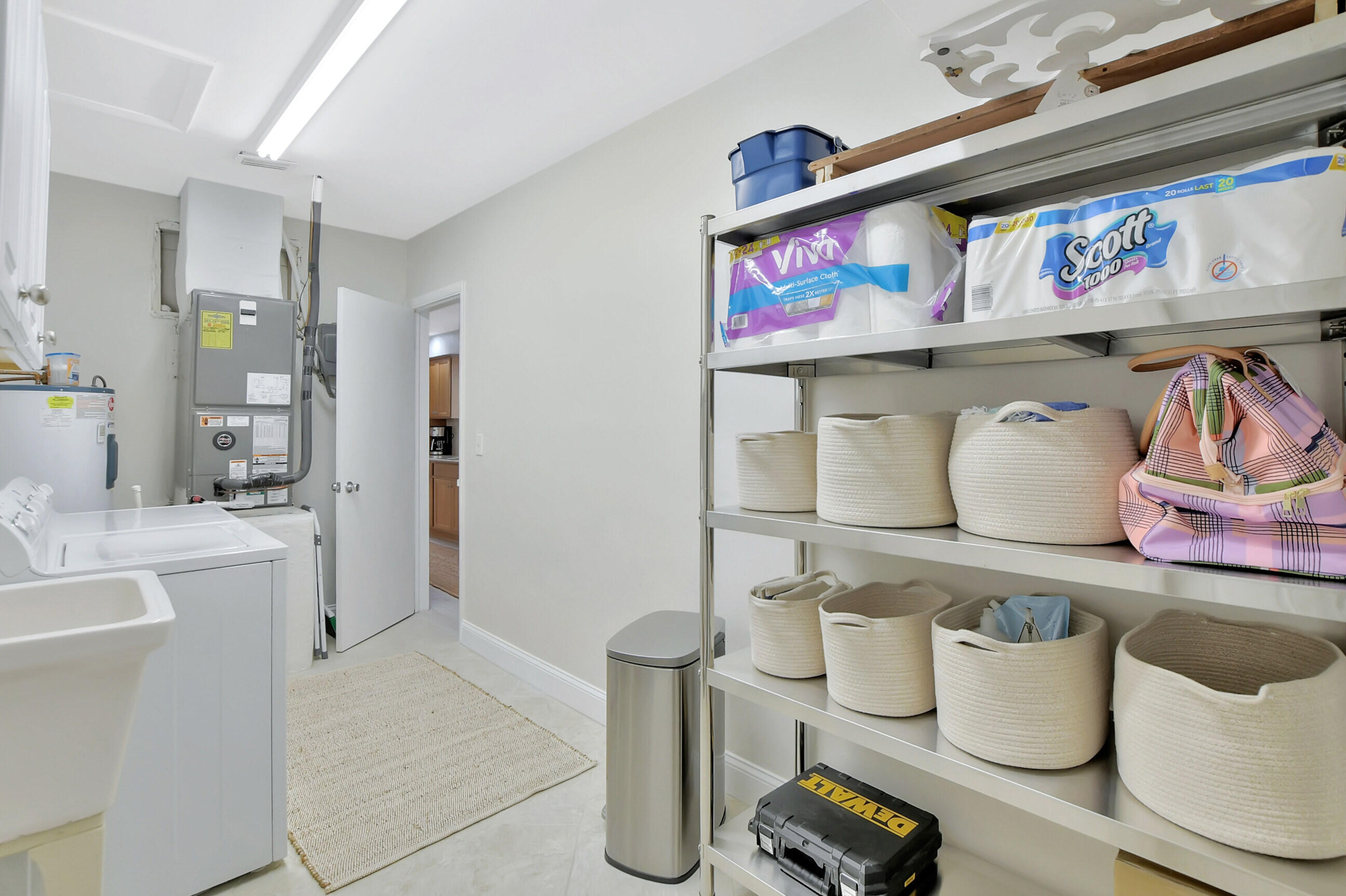 1133 Southwest 7th Street Boca Raton, FL 33486 - Photo 11 of 20 a kitchen with a oven and a refrigerator
