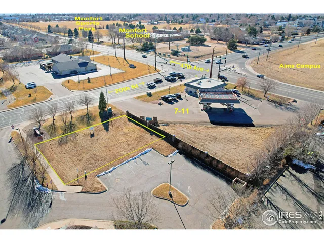 an aerial view of a house with a swimming pool