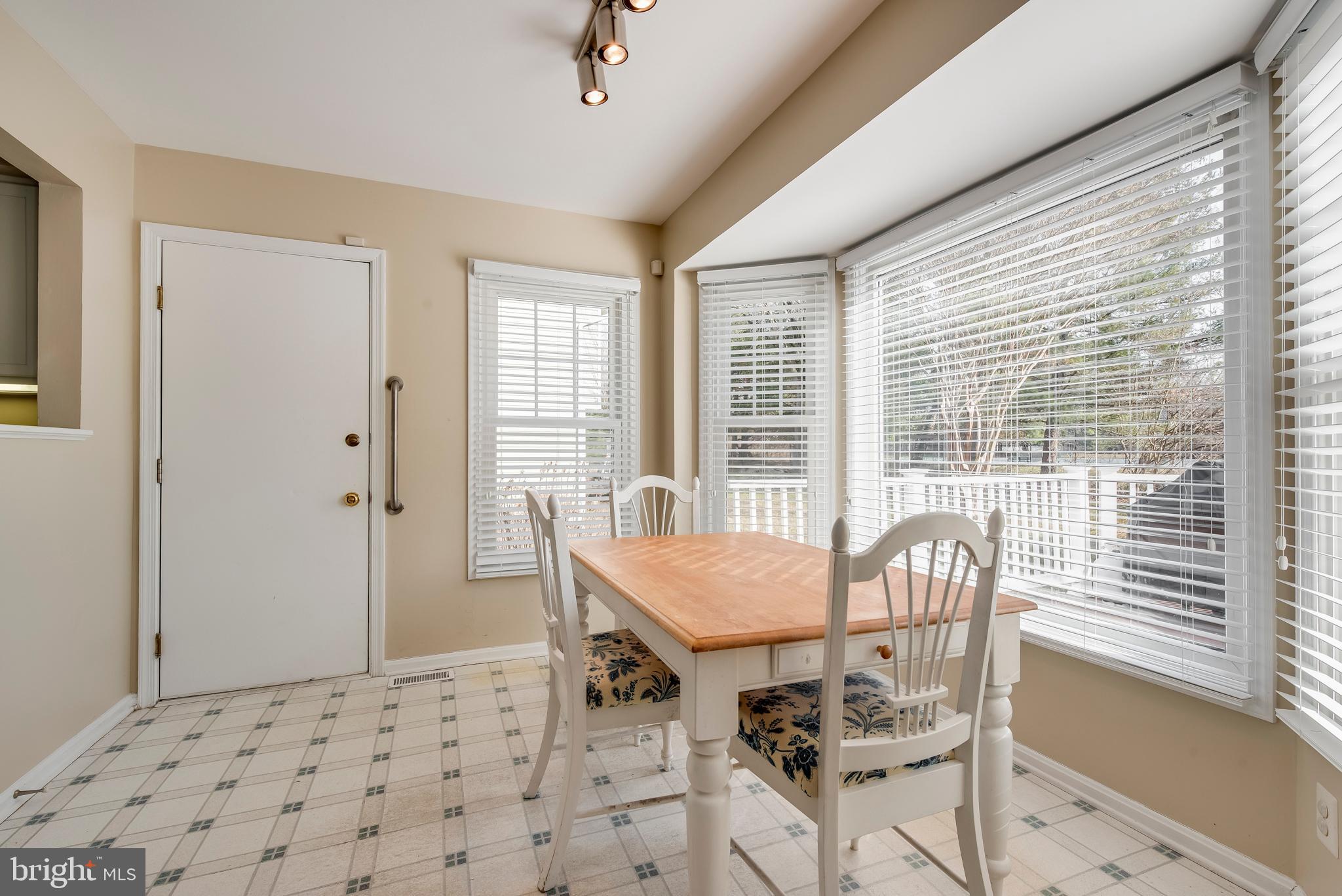 314 Canterfield Road Annapolis, MD 21403 - Photo 30 of 37 a view of a dining room with furniture and windows