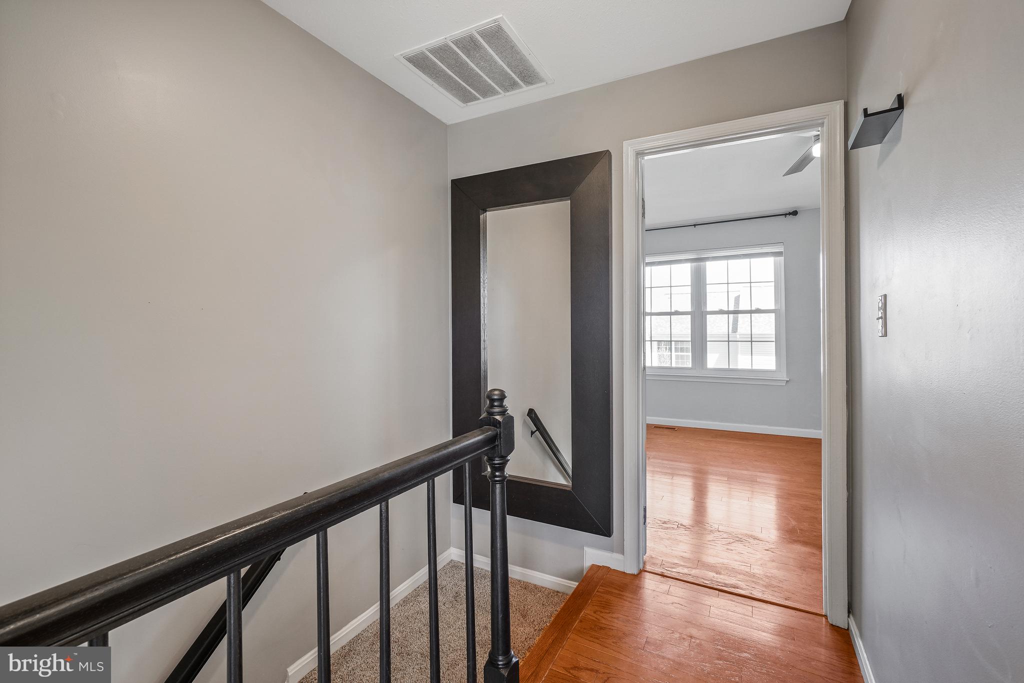 46724 Summit Terrace Sterling, VA 20164 - Photo 16 of 28 Upper Level Hallway / Landing - mirror conveys