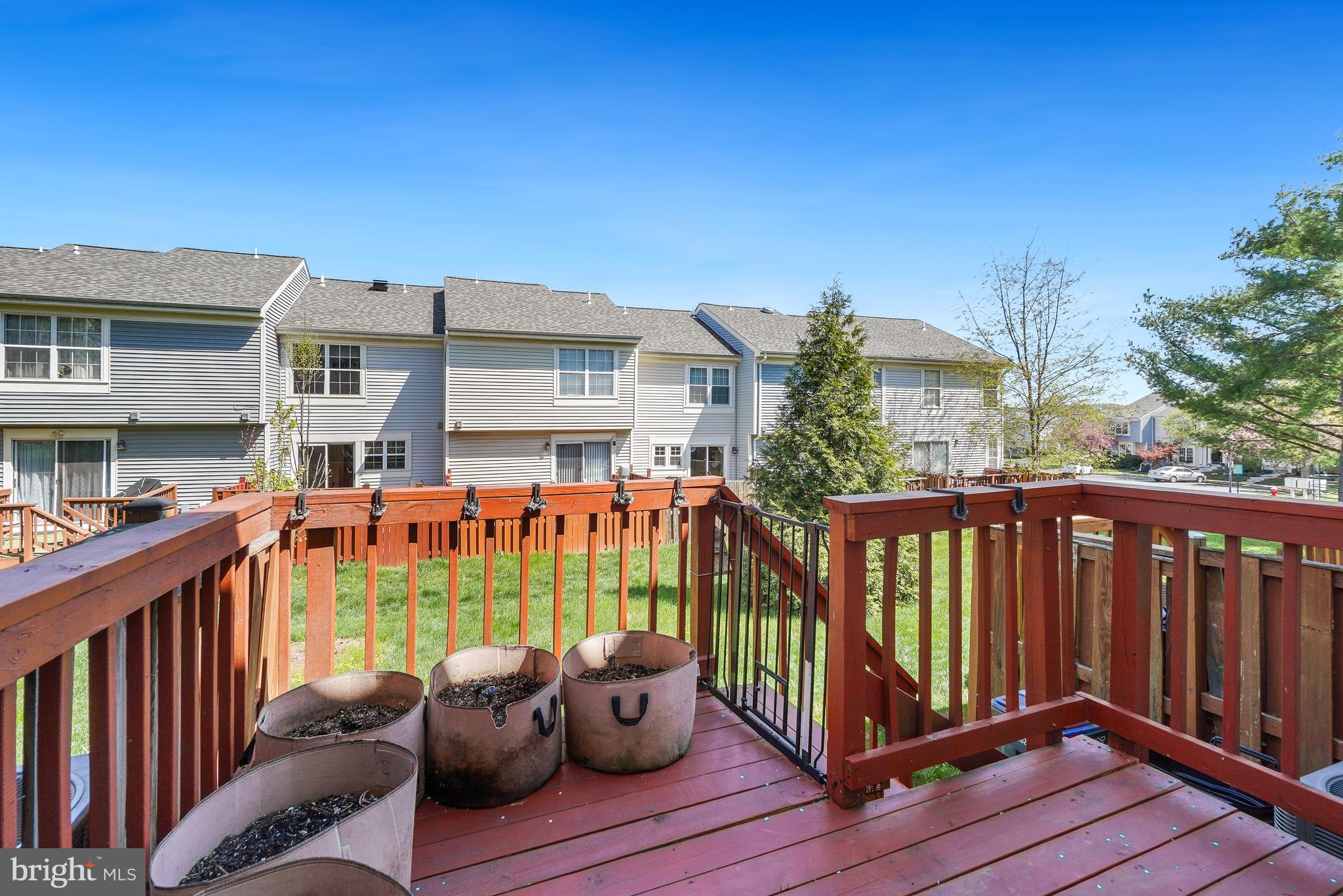46724 Summit Terrace Sterling, VA 20164 - Photo 24 of 28 Rear Deck - planters convey
