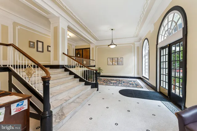 a view of entryway with a front door