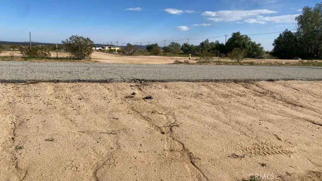 0 Neuralia Edwards, CA 93523 - Photo 15 of 17 a view of a dry yard with wooden fence