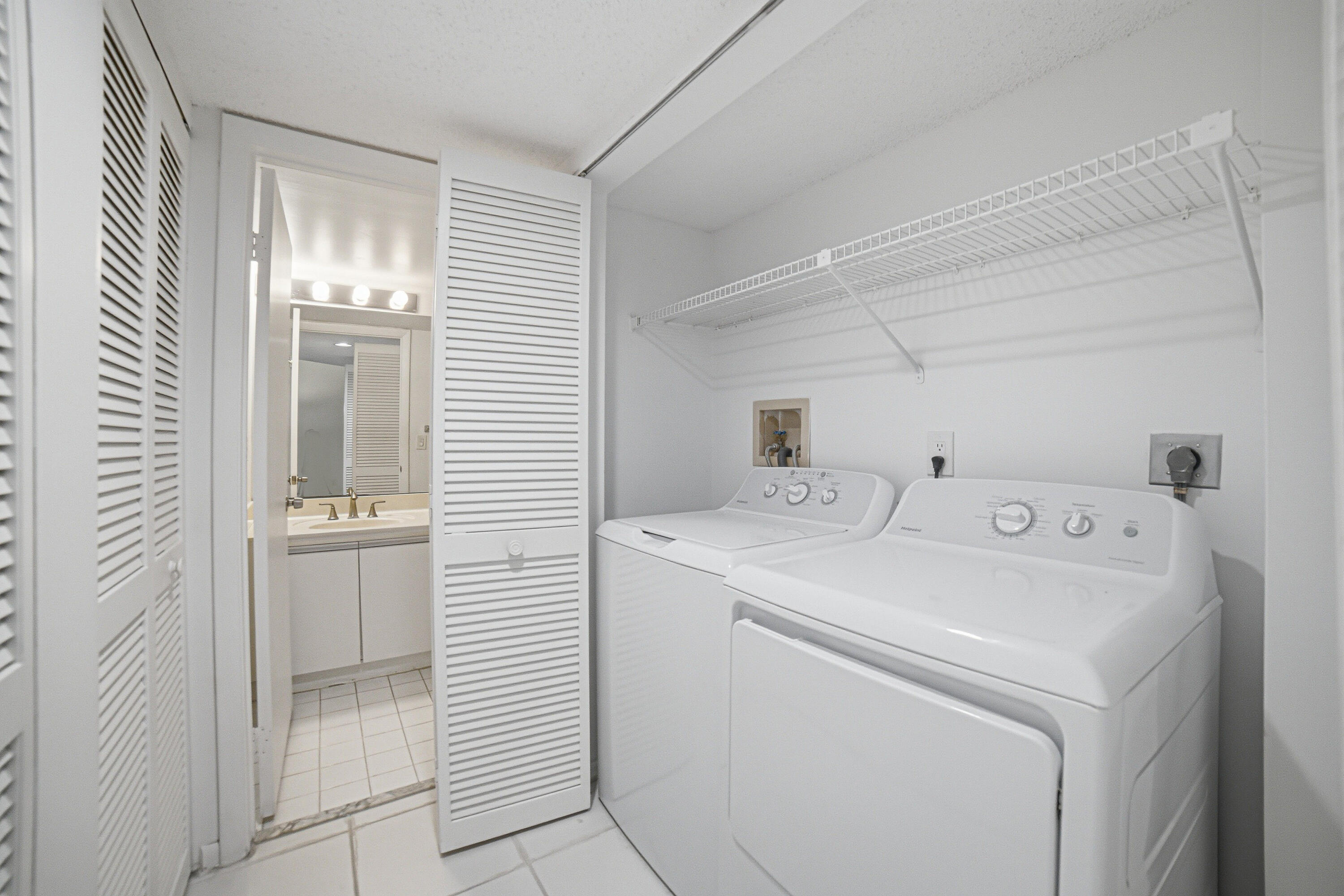 260 Northwest 67th Street, Unit A203 Boca Raton, FL 33487 - Photo 14 of 25 Laundry