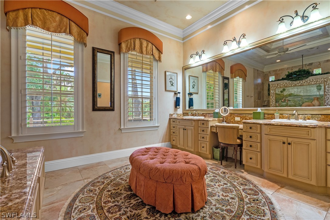 1980 Fort Denaud Road Fort Denaud, FL 33935 - Photo 22 of 35 a spacious bathroom with a sink double vanity and a mirror